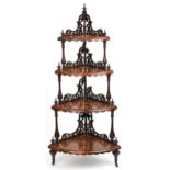 Victorian inlaid burr walnut four tier corner whatnot on casters, 150cm high