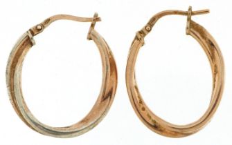 Two silver gilt hoop earrings, each 2.4cm high, total 1.7g