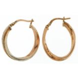 Two silver gilt hoop earrings, each 2.4cm high, total 1.7g