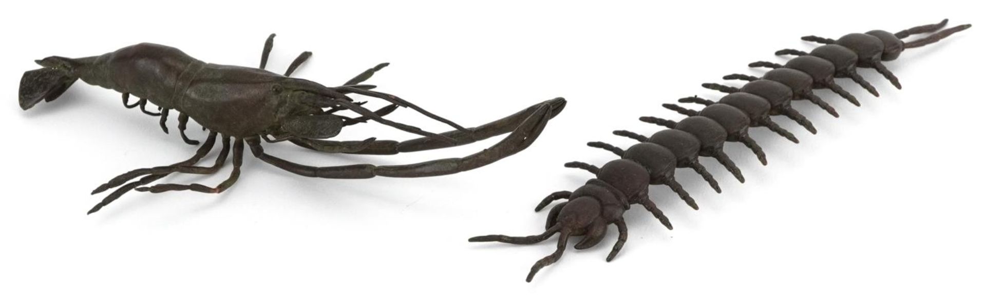 Two Japanese patinated bronze okimonos including an articulated centipede, the largest 14cm in