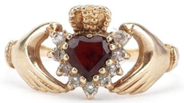 9ct gold garnet and clear stone Claddagh ring, size Q, 2.1g