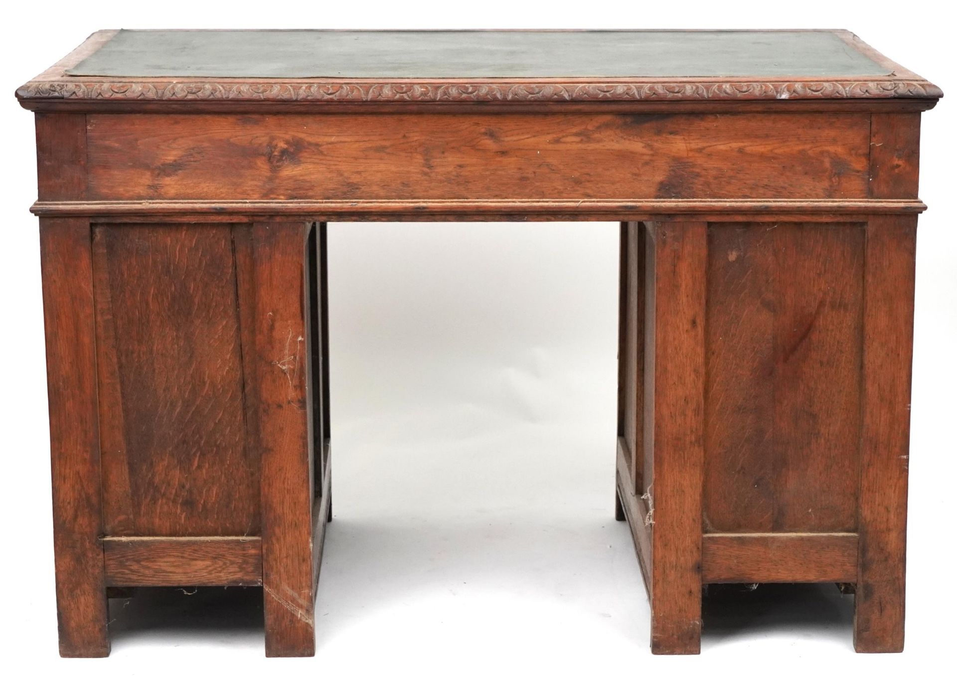 Victorian oak twin pedestal desk carved with a green man masks, fitted with an arrangement of nine - Image 4 of 5