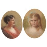 Top half portraits of a mother and daughter, pair of early 20th century oval pastels, one signed