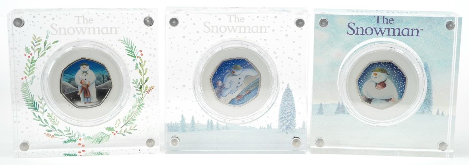 Three The Snowman silver proof fifty pence pieces by The Royal Mint, housed in Perspex slabs with - Image 2 of 3