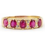 18K gold ruby and diamond half eternity ring set with five rubies and eight diamonds, each ruby