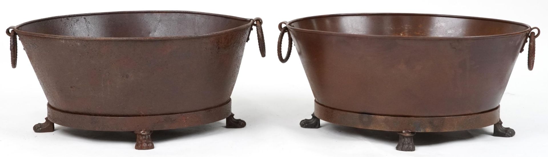 Pair of cast metal oval lock buckets with ring turned handles on paw feet, each 32cm H x 72cm W x - Image 3 of 3