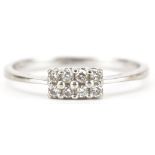 9ct white gold diamond nine stone cluster ring, size N/O, 1.3g