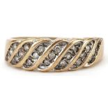 9ct gold diamond cluster ring set with twenty one diamonds, total diamond weight approximately 0.