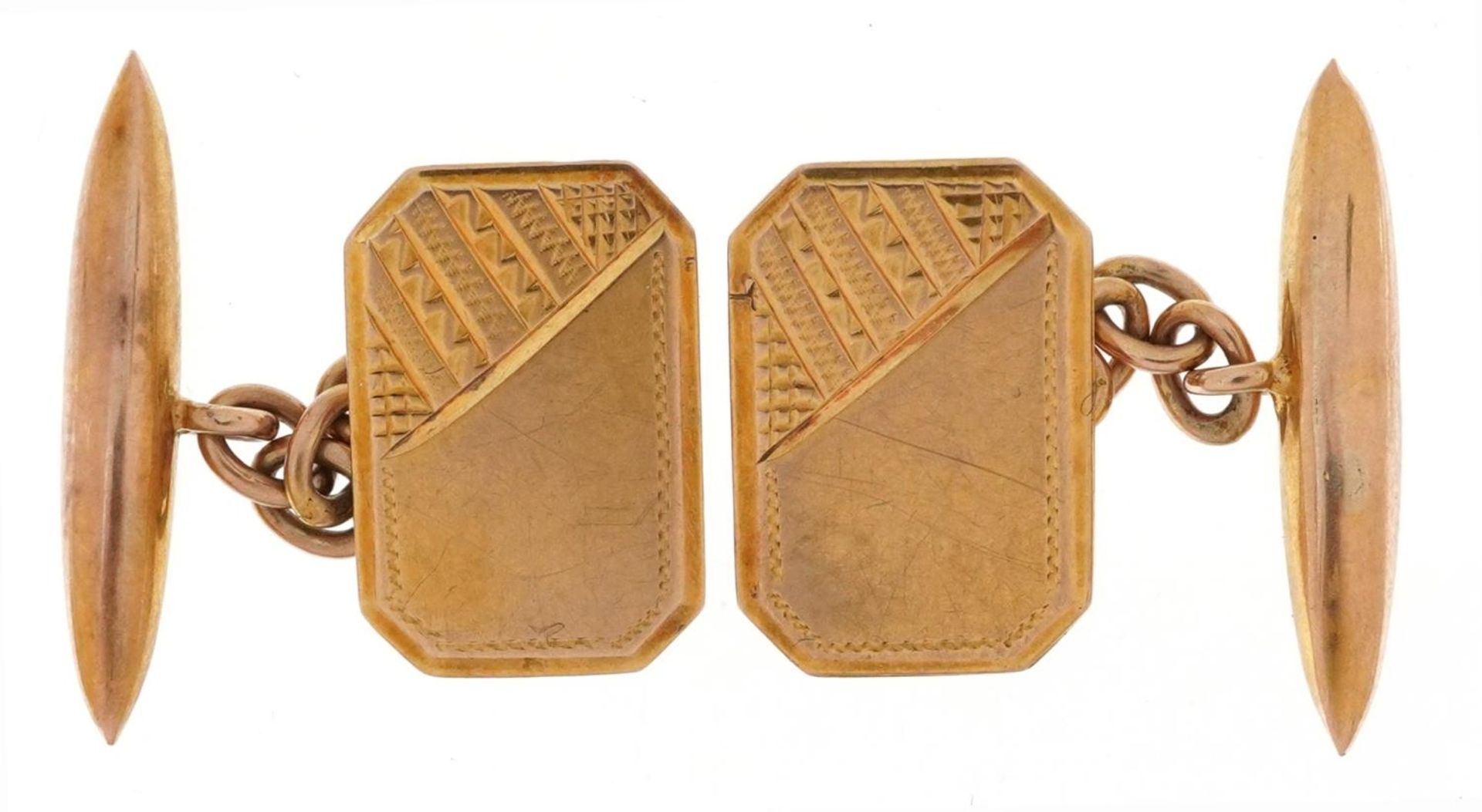 Pair of 9ct gold engine turned cufflinks housed in a Garrard & Co Regent Street jeweller's box, 2.