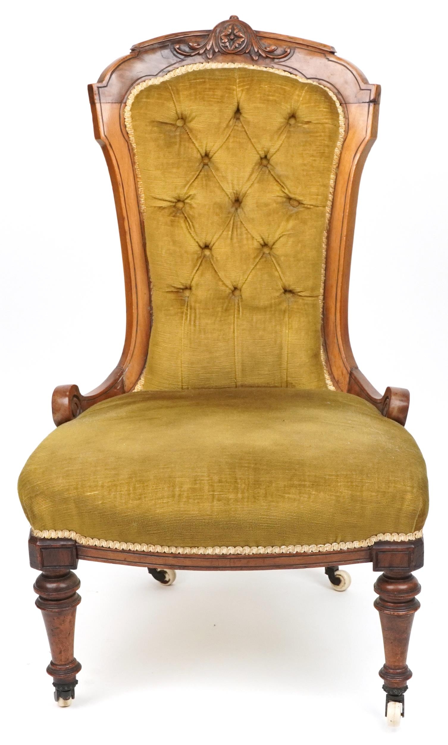 Victorian walnut side chair carved with a flower head and foliage having olive green button back - Image 2 of 4