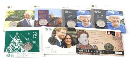 Six commemorative five pound uncirculated coins and a Queen Elizabeth I commemorative five pound