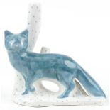 Large Rye Pottery fox beside a trunk, 29cm wide