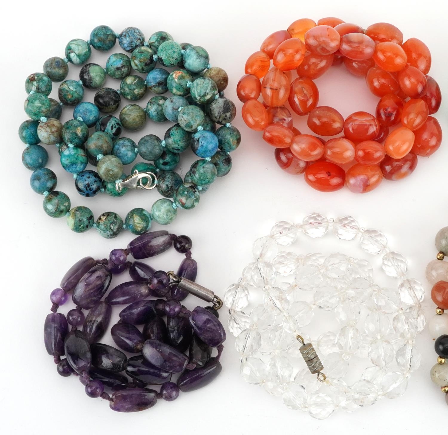 Eight crystal and semi precious stone necklaces including amethyst, carnelian and jade, the - Image 2 of 3