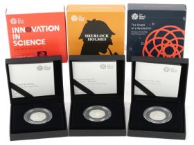 Three Royal Mint silver proof fifty pence pieces by The Royal Mint with fitted cases and boxes