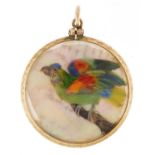 Unmarked gold mother of pearl collage locket decorated in feathers with two birds, 3.2cm in