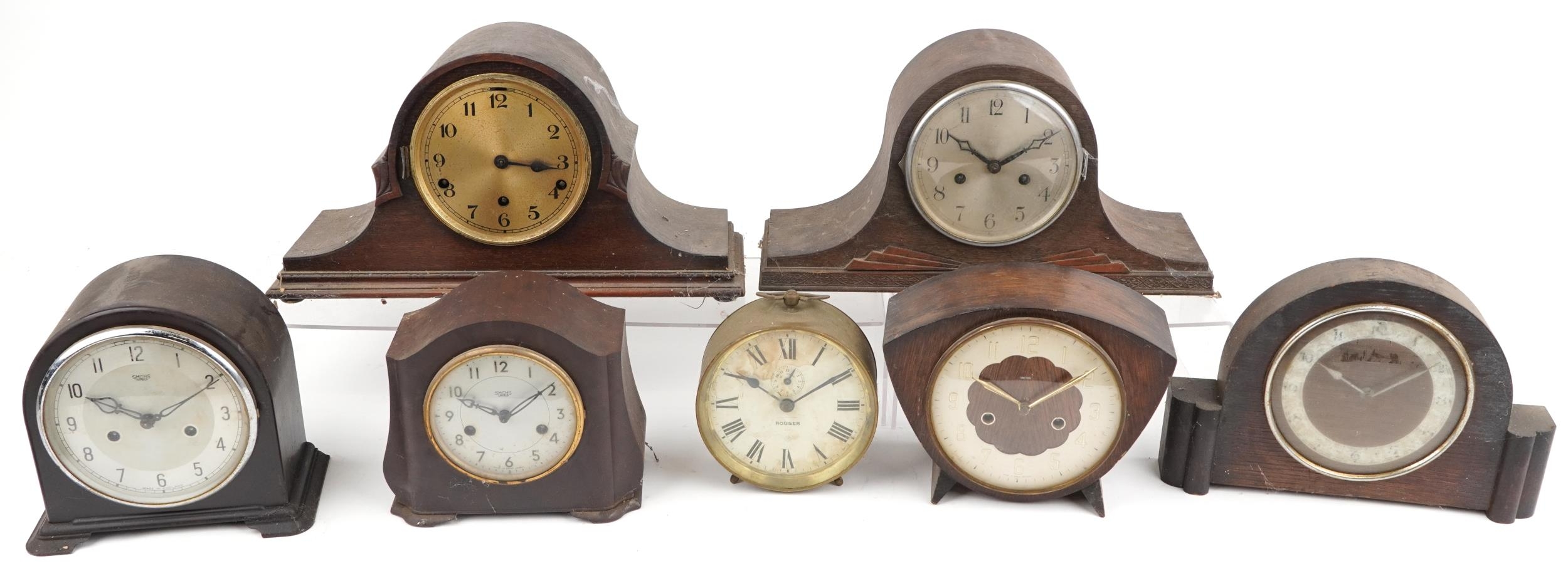 Six early 20th century oak and Bakelite mantle clocks and a American ship's design alarm example