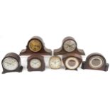 Six early 20th century oak and Bakelite mantle clocks and a American ship's design alarm example