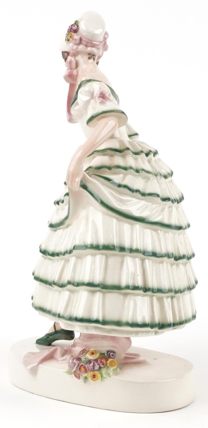 Keramos, Austrian Art Deco figurine of a female wearing a green brimmed dress, 31cm high - Image 2 of 4