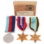 Three British military World War II medals with box of issue including Air Crew Europe star, the box