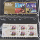Collection of London 2012 Olympic Games mint unused stamps arranged in an album