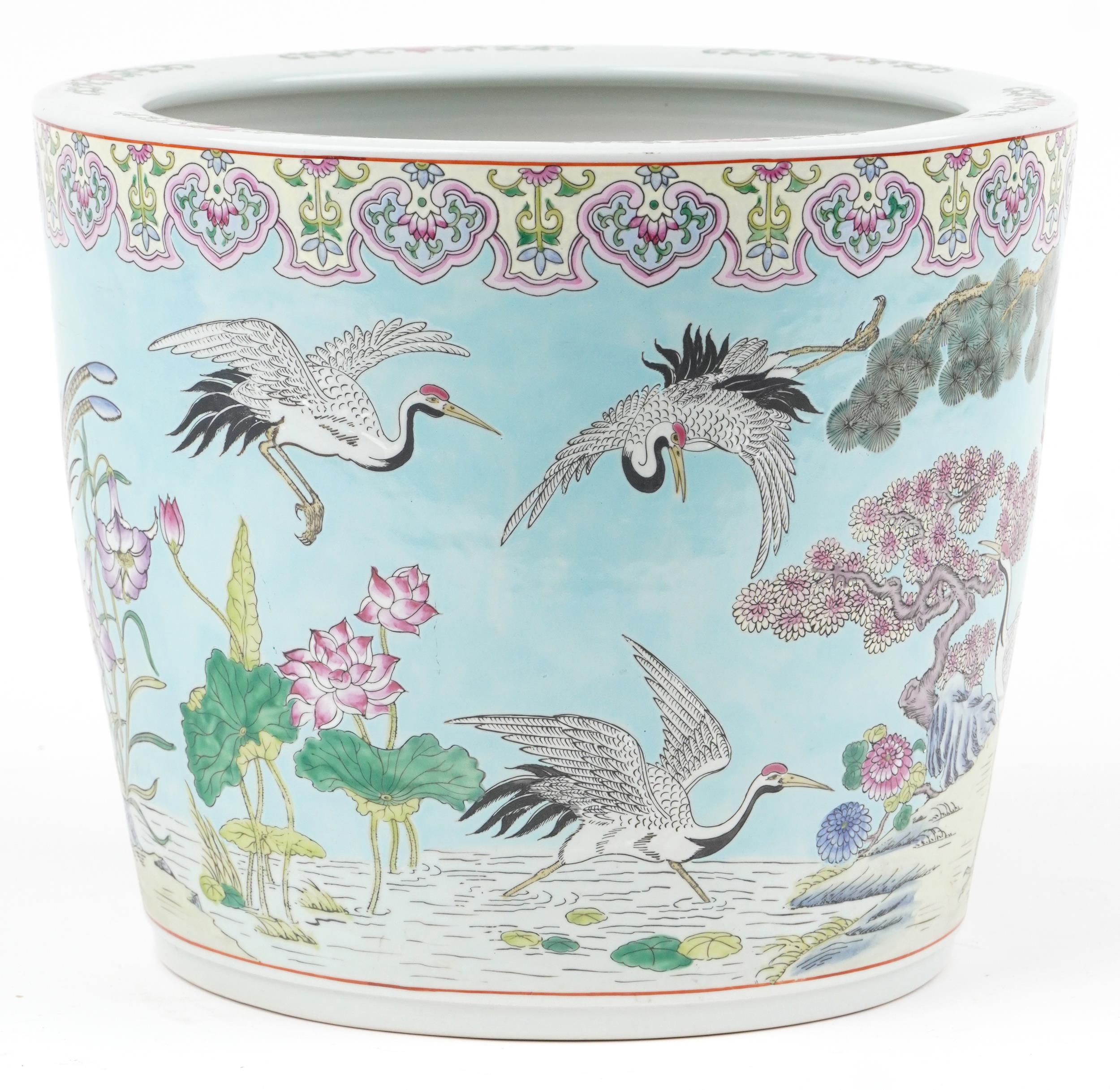 Large Chinese turquoise ground porcelain jardiniere hand painted in the famille rose palette with - Image 4 of 7