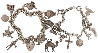 Two silver charm bracelets with a collection of mostly silver charms, including opening church,