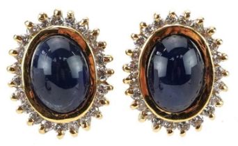 Pair of 18ct gold cabochon sapphire and diamond cluster stud earrings, each 1.3cm high, total 6.9g