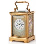 Miniature brass cased carriage clock with Sevres type porcelain panels depicting flowers, 5.5cm high