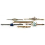 Six antique and later bar brooches, some 9ct gold, including a white metal Art Deco brooch set