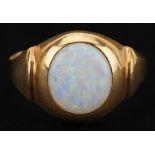 Unmarked gold cabochon opal ring, tests as 9ct gold, the opal approximately 8.90mm x 8.20mm x 2.60mm