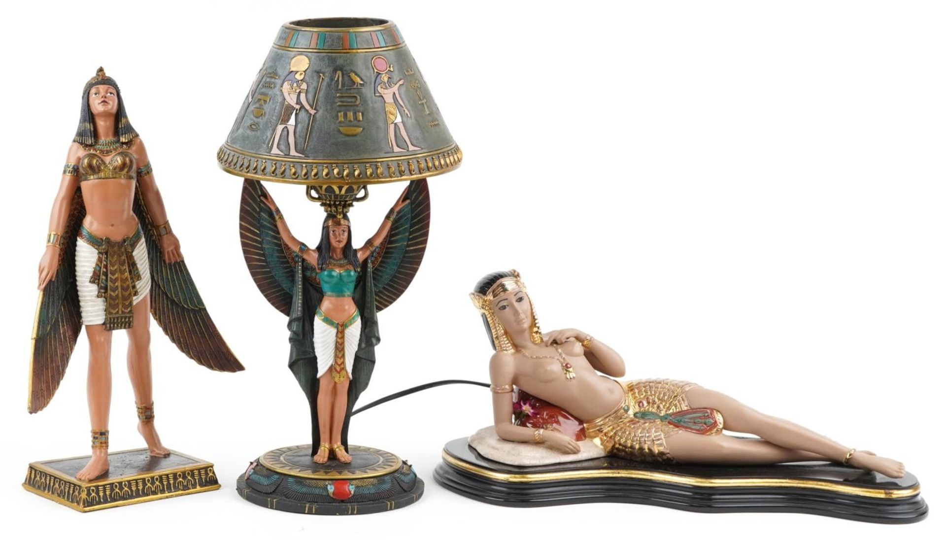 Egyptian Revival figures and a Nemesis Now Wings of Isis table lamp, the figures comprising