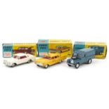 Three vintage Corgi Toys diecast vehicles with boxes comprising Chevrolet New York Taxi Cab 221,