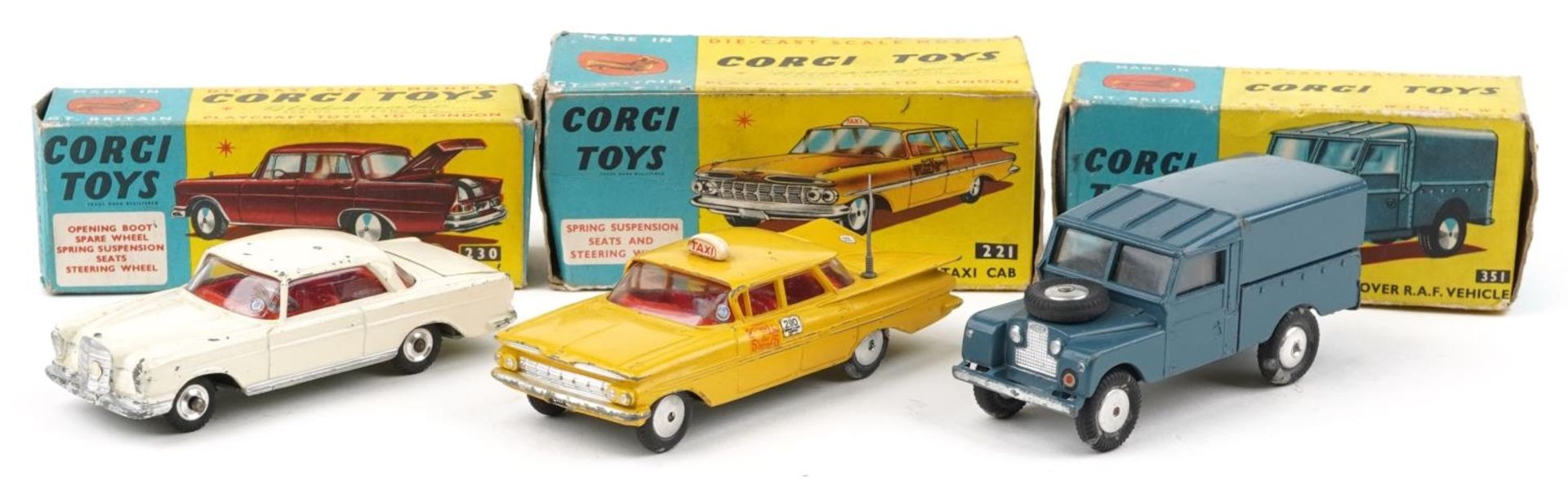 Three vintage Corgi Toys diecast vehicles with boxes comprising Chevrolet New York Taxi Cab 221,