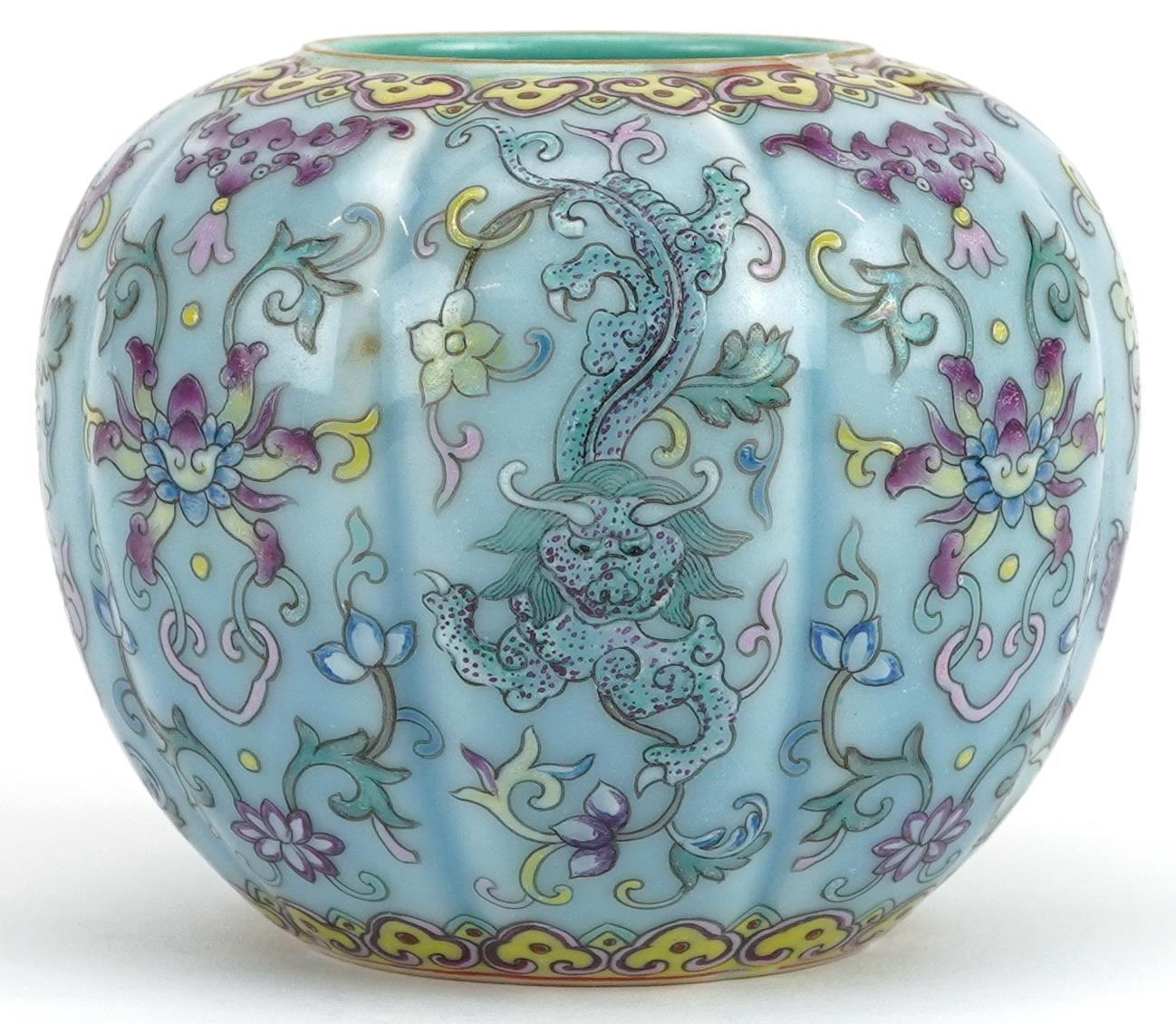 Chinese porcelain purple and turquoise ground vase hand painted in the famille rose palette with
