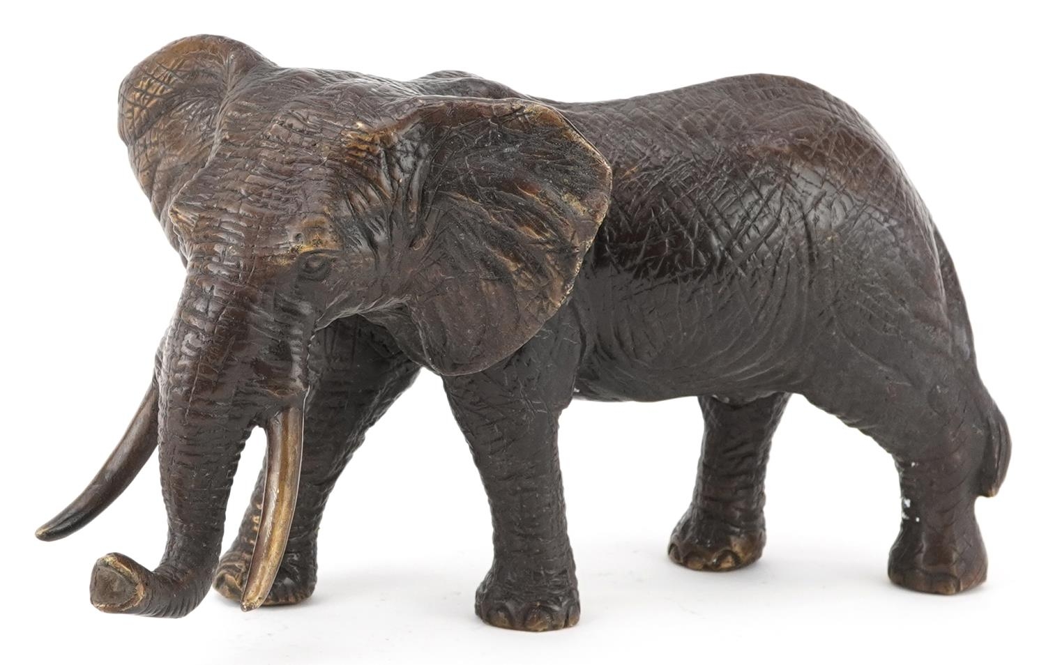 Japanese patinated okimono of a bull elephant, 30cm in length