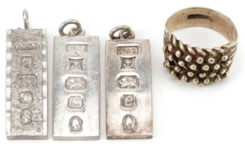 Silver jewellery comprising three ingot pendants and a five row keeper ring, the ring size V,