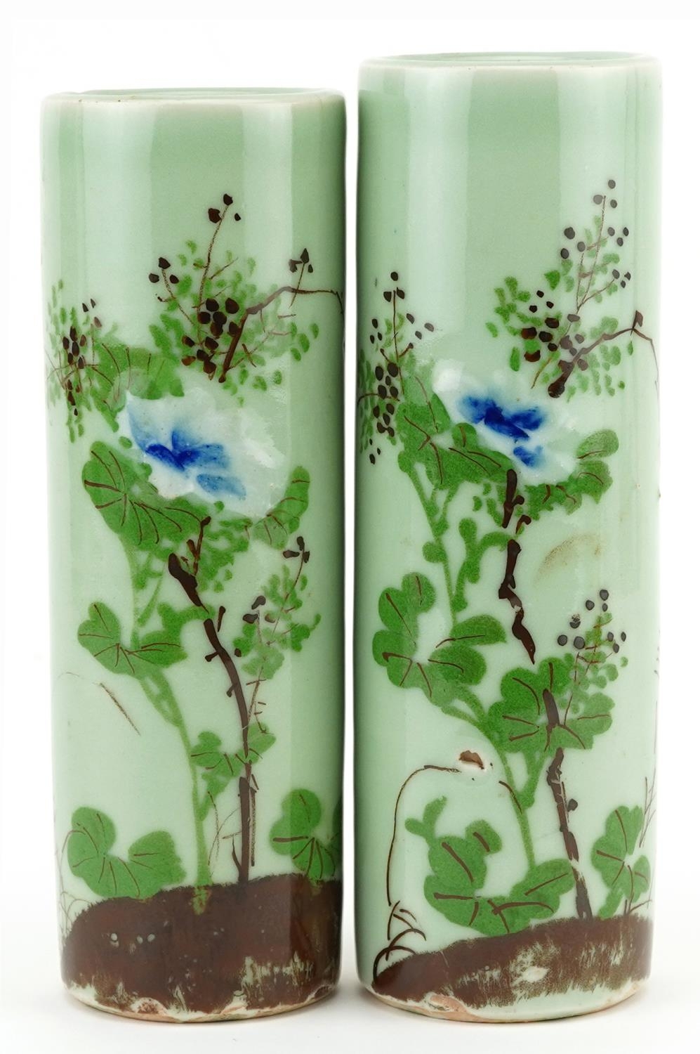 Matched pair of Japanese celadon glazed porcelain cylindrical vases hand painted with flowers,