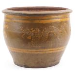 Large Chinese archaic style terracotta planter having and ash and brown glaze, incised with two