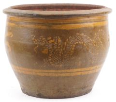 Large Chinese archaic style terracotta planter having and ash and brown glaze, incised with two