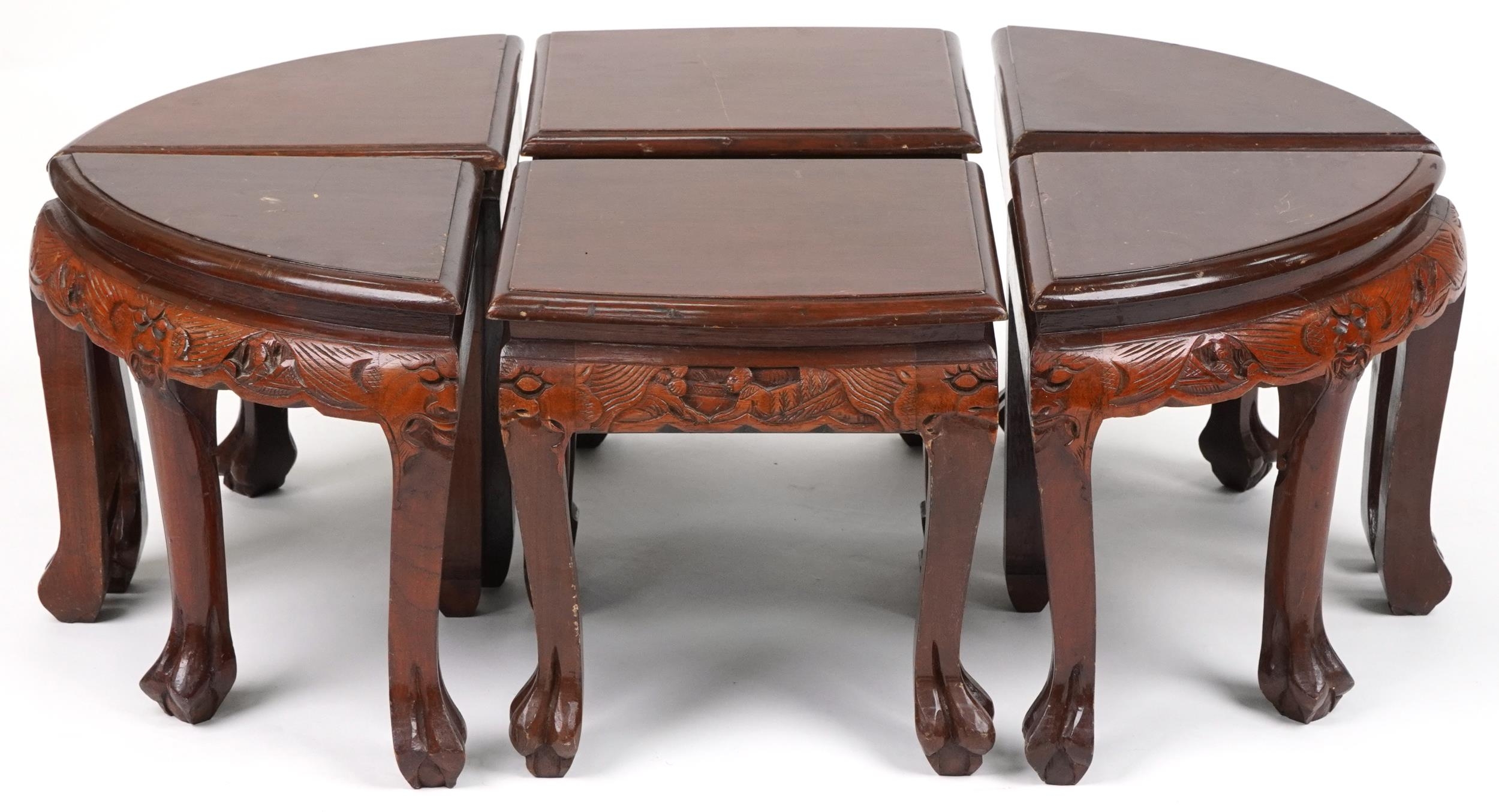 Nest of seven Chinese camphor wood occasional tables comprising an oval coffee table housing six - Image 7 of 9