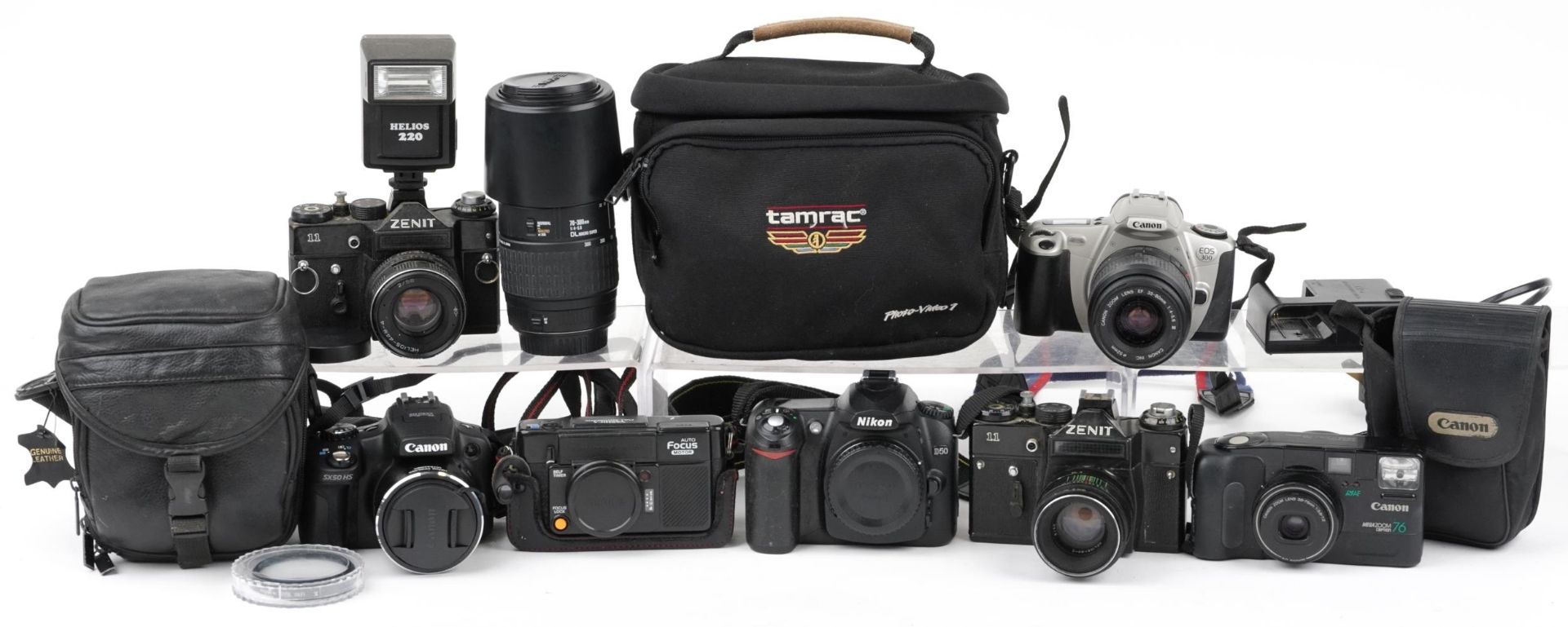 Vintage and later cameras and accessories including a Yoshika auto focus motor, Cannon EOS 300,