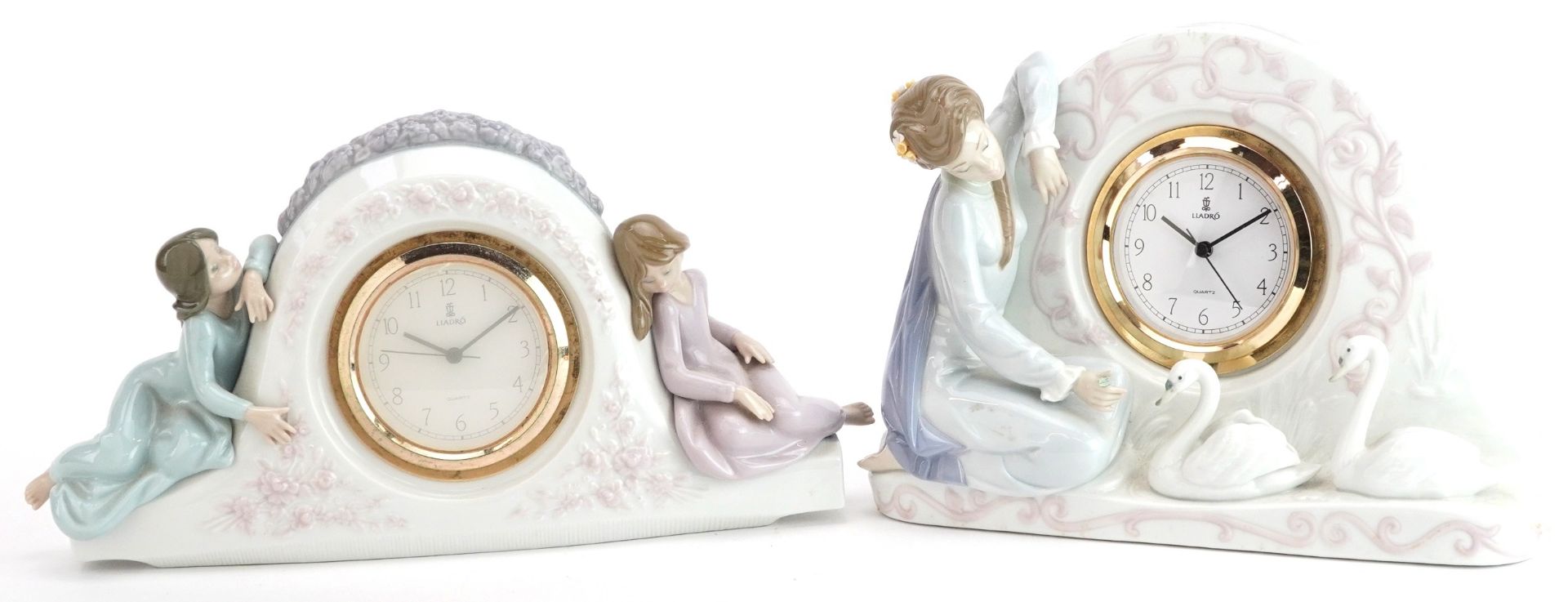Two Lladro mantle clocks comprising Swan clock 5230 and Two Sisters clock 5770, the largest 32cm