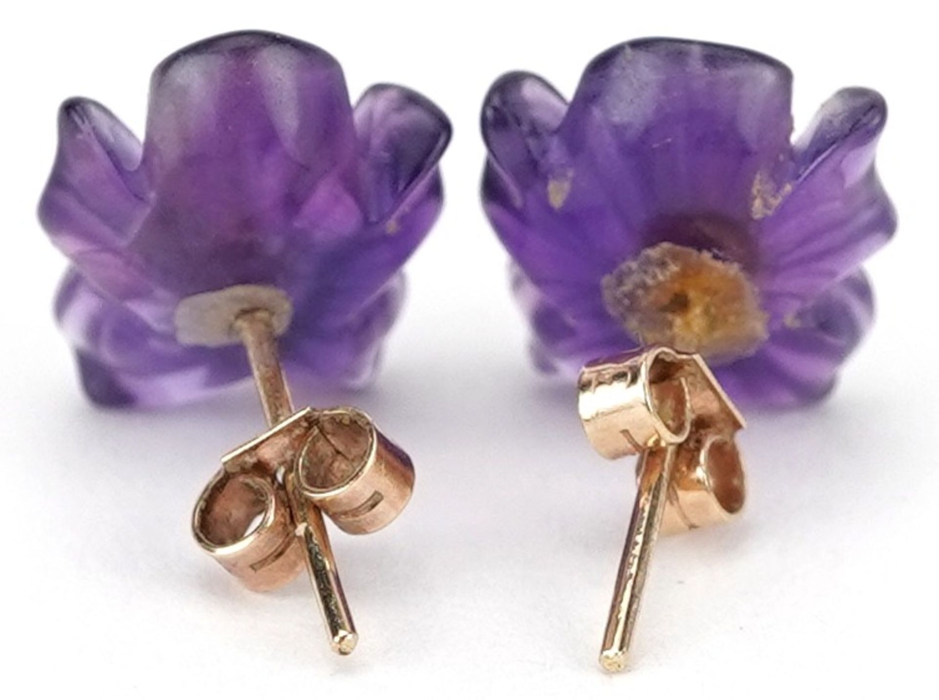 Pair of unmarked gold diamond solitaire and amethyst flower head stud earrings, each diamond - Image 2 of 2