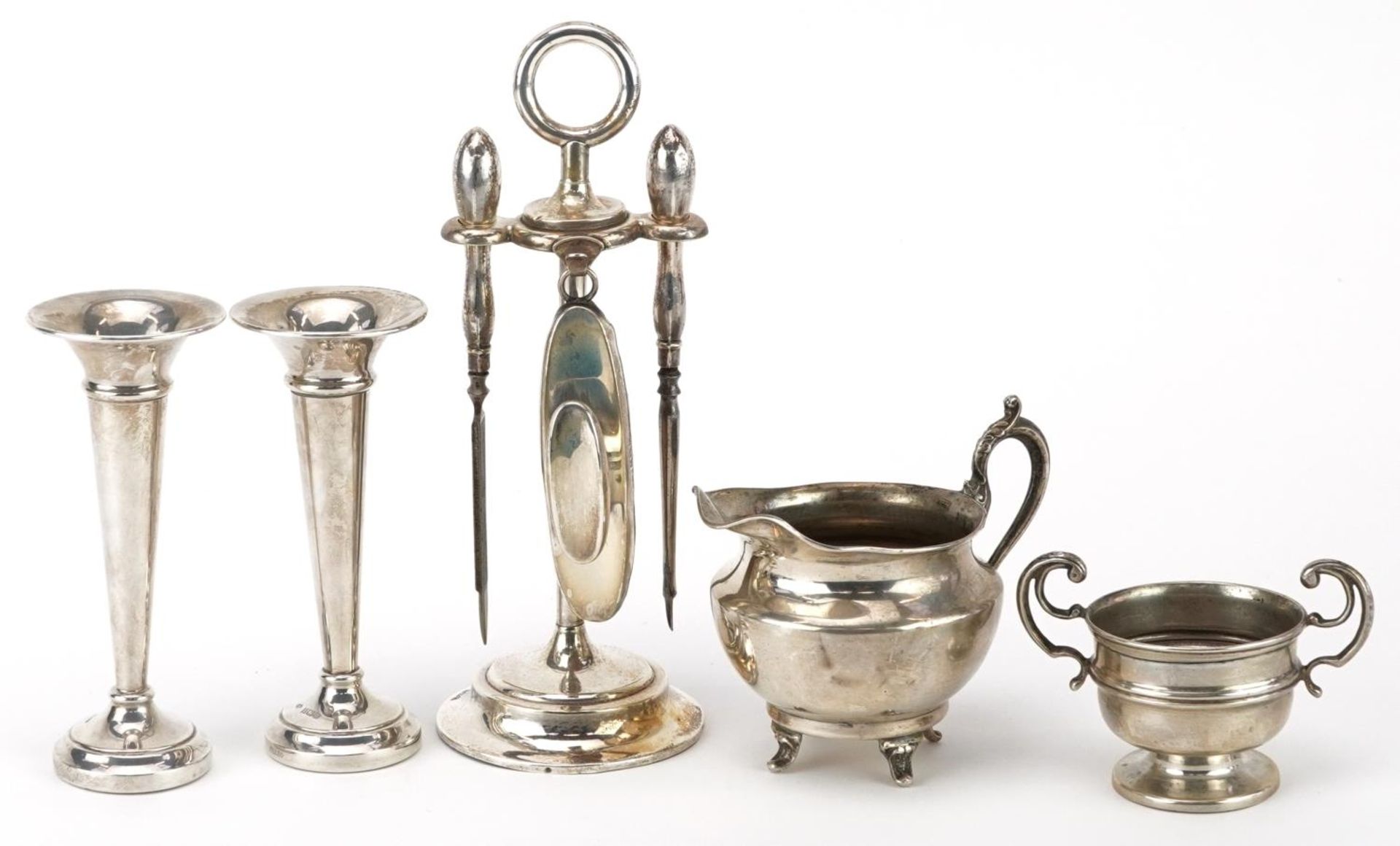 Edwardian and later silver including vanity tools on stand, pair of miniature trumpet shaped vases