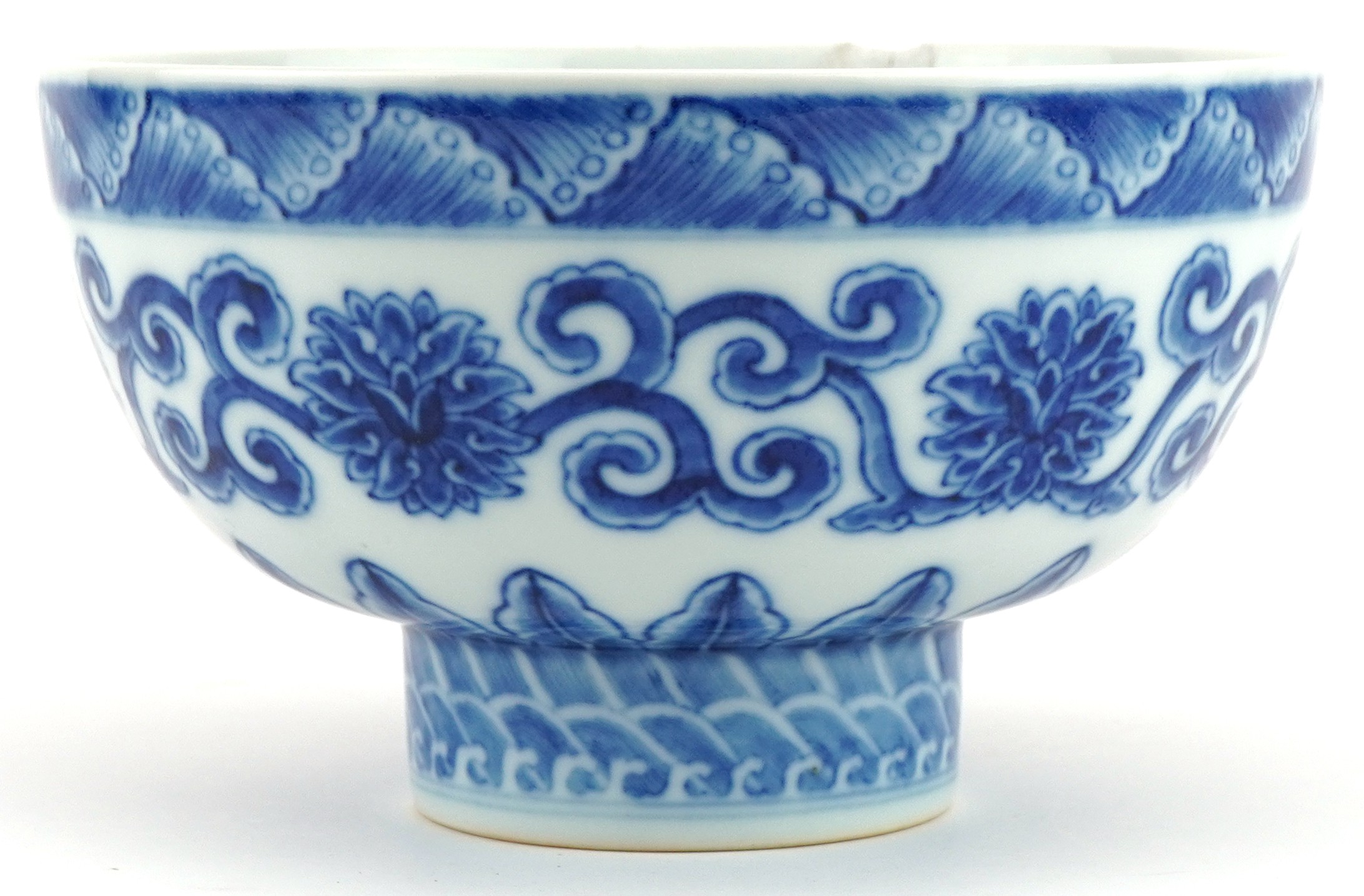Chinese blue and white porcelain footed bowl hand painted with flower heads amongst scrolling - Image 2 of 7