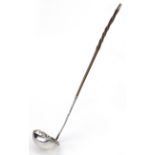 Georgian silver ladle with twisted horn handle, incomplete hallmarks, D H & Co maker's mark, 33cm in
