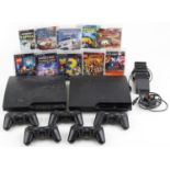 Two Sony PlayStation 3 games consoles with five controllers, docking station and games including Tom