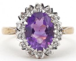 18ct gold amethyst and diamond cluster ring, the amethyst approximately 9.0mm x 7.10mm x 5.0mm deep,