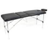 Folding aluminium and black leatherette massage table with protective bag, 83cm H x 184cm W x 59cm D