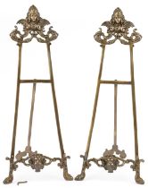 Pair of large Rococo style brass easel stands, 58cm high
